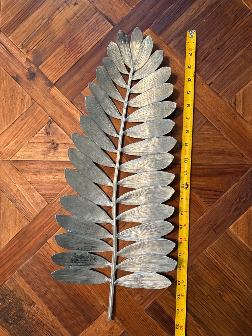 Michael Aram 21-inch silver-toned palm leaf tray made from cast aluminum